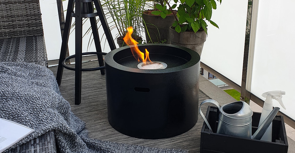 Biokominek wolnostojący Calcone z kamieniami ozdobnymi okrągły o średnicy 32,5 cm czarny  - zdjęcie 3