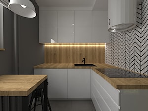 mieszkanie grodzisk mazowiecki 40 m2 - Średnia biała szara z zabudowaną lodówką z nablatowym zlewozmywakiem kuchnia w kształcie litery l z oknem, styl nowoczesny - zdjęcie od noobo studio