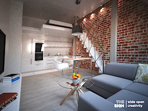 Piętrowe mieszkanie w kamienicy - Średnia otwarta z salonem z kamiennym blatem szara z zabudowaną lodówką kuchnia jednorzędowa, styl skandynawski - zdjęcie od The Sign