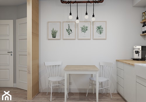 Mieszkanie na Warszawskim Żoliborzu - Średnia otwarta z salonem biała z zabudowaną lodówką z nablatowym zlewozmywakiem kuchnia jednorzędowa, styl industrialny - zdjęcie od Studio 36m2
