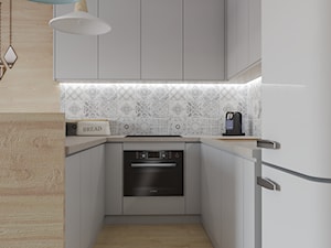 Segment w Ursusie - Średnia otwarta biała z zabudowaną lodówką kuchnia w kształcie litery u, styl skandynawski - zdjęcie od Studio 36m2