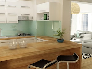 Salon z biurem na poddaszu - Średnia otwarta zielona kuchnia w kształcie litery u z wyspą lub półwyspem, styl minimalistyczny - zdjęcie od D2 Studio