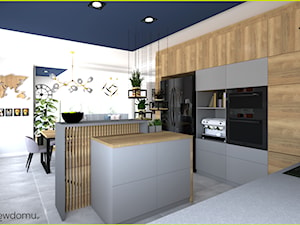 Duży salon z kuchnią z niebieskimi dodatkami - zdjęcie od wnetrzewdomu