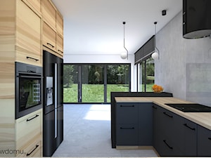 Elegancka ciemna kuchnia - połączenie czerni, drewna betonu - zdjęcie od wnetrzewdomu