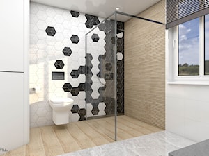Nowoczesna przestronna łazienka z wanną i kabiną prysznicową - zdjęcie od wnetrzewdomu