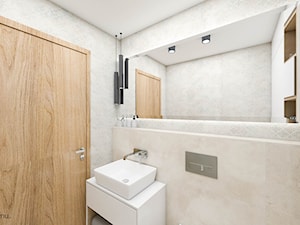 Mała łazienka z białą zabudową