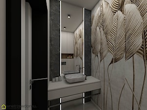 Toaleta ze stylowym liściastym motywem - zdjęcie od wnetrzewdomu