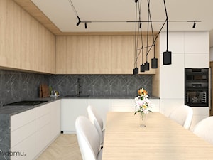 Salon z aneksem kuchennym o nietypowym kształcie - zdjęcie od wnetrzewdomu