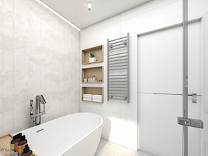 Jasna łazienka z wanną i prysznicem - zdjęcie od wnetrzewdomu