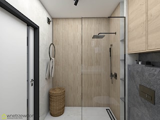 Biel , drewno oraz czerń w nowoczesnej łazience