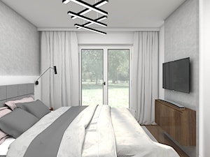 Nowoczesna sypialnia z betonem architektonicznym na ścianie - zdjęcie od wnetrzewdomu