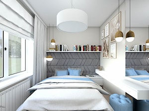 Hotelowa sypialnia z tapicerowaną ścianą