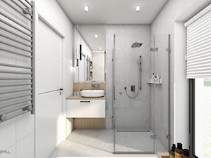 Jasna łazienka z wanną i prysznicem - zdjęcie od wnetrzewdomu