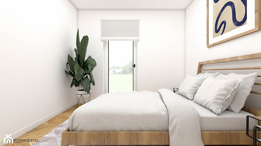 Minimalistyczna sypialnia z drewnianym łóżkiem - zdjęcie od wnetrzewdomu