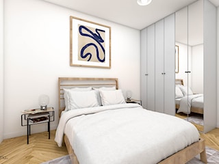 Minimalistyczna sypialnia z drewnianym łóżkiem