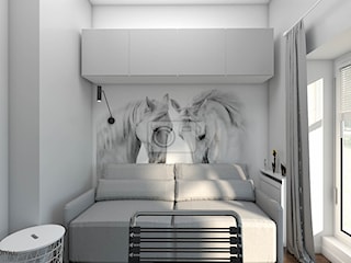 Minimalistyczny pokój z tapetą w konie