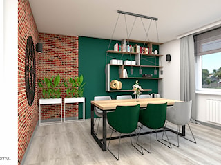 Salon z jadalnią ze ścianą w kolorze butelkowej zieleni