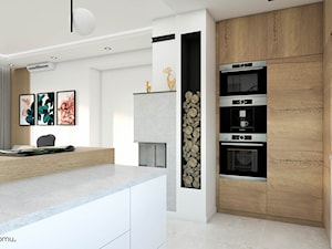 Przestronny salon z kuchnią w nowoczesnej kolorystyce - zdjęcie od wnetrzewdomu