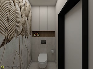 Toaleta ze stylowym liściastym motywem - zdjęcie od wnetrzewdomu