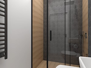 Mała łazienka z kabiną prysznicową i ciemnymi dodatkami - zdjęcie od wnetrzewdomu