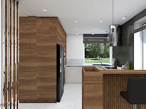 Przestronny salon z kuchnią w połączeniu beżu oraz drewna orzechowego - zdjęcie od wnetrzewdomu