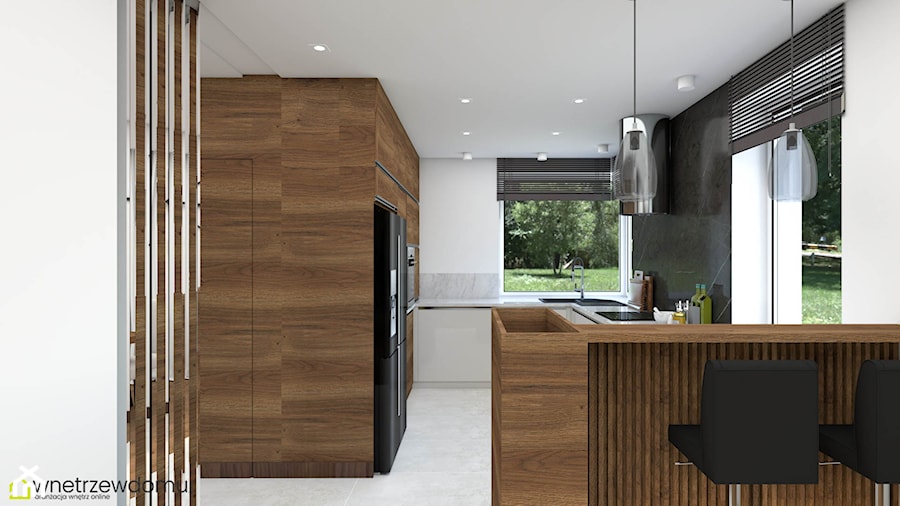 Przestronny salon z kuchnią w połączeniu beżu oraz drewna orzechowego - zdjęcie od wnetrzewdomu