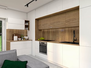 Niewielki salon z kuchnią w jasnych kolorach - zdjęcie od wnetrzewdomu