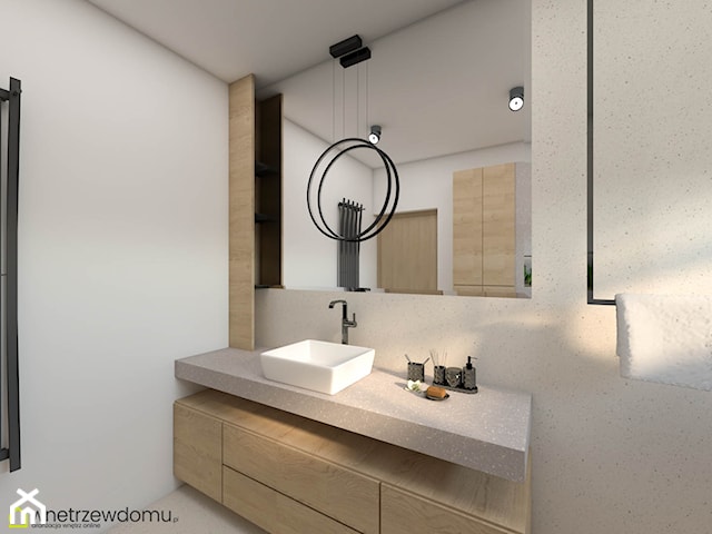 Niewielka nowoczesna łazienka z kabiną prysznicową
