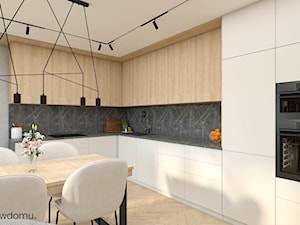 Salon z aneksem kuchennym o nietypowym kształcie - zdjęcie od wnetrzewdomu