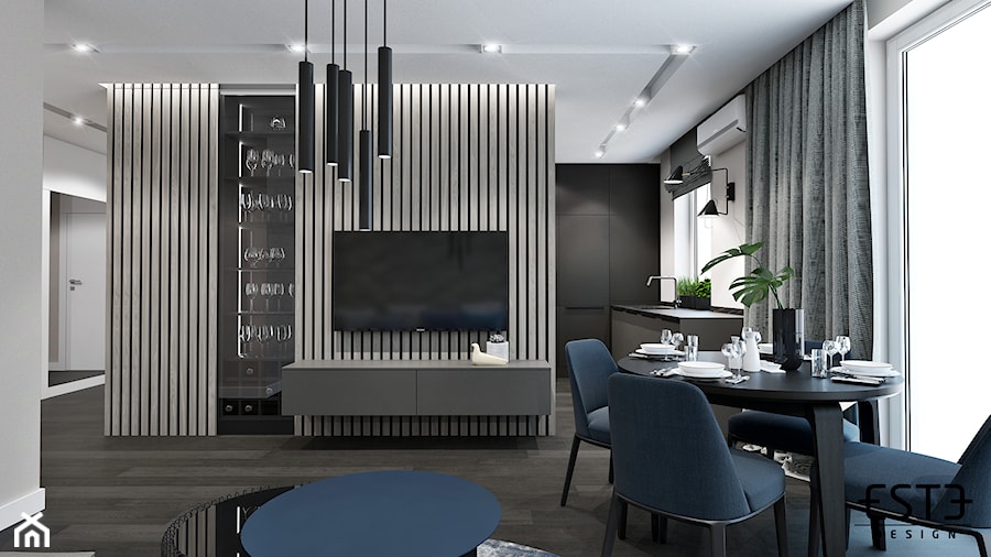 Mieszkanie w Warszawie - Duży szary salon z kuchnią z jadalnią, styl nowoczesny - zdjęcie od Este Design
