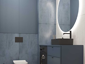 Łazienka z granatową płytką i okrągłym lustrem - zdjęcie od KAROLINA POPIEL - ARCHITEKTURA WNĘTRZ