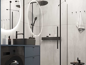 Łazienka z prysznicem i pralką z granatowymi akcentami. - zdjęcie od KAROLINA POPIEL - ARCHITEKTURA WNĘTRZ