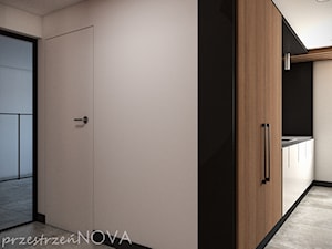 Przestrzeń biurowa firmy Repablo - Mała otwarta z salonem beżowa czarna z zabudowaną lodówką z nablatowym zlewozmywakiem kuchnia jednorzędowa, styl industrialny - zdjęcie od przestrzeńNOVA