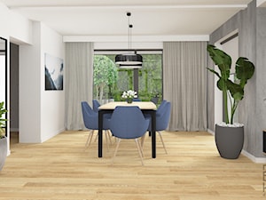 Betonowa farba, szary duży narożnik, drewniana podłoga i drewniane listwy ścienne. - zdjęcie od Boka Design