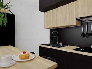 Kuchnia czarno drewniana - zdjęcie od Aleksandra Regiec - projektowanie wnętrz