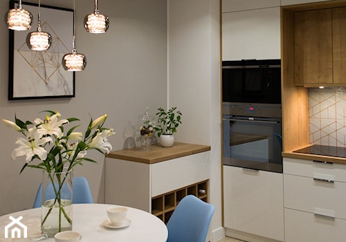 Mieszkanie na wynajem - Otwarta szara z zabudowaną lodówką kuchnia jednorzędowa, styl nowoczesny - zdjęcie od Biuro projektowe "Patio" Ewa Szymczak