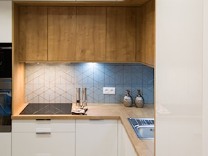 Mieszkanie na wynajem - Mała zamknięta szara kuchnia w kształcie litery l, styl nowoczesny - zdjęcie od Biuro projektowe "Patio" Ewa Szymczak