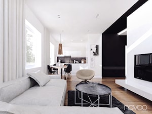 004_16 MIELEC - Średni biały czarny salon z kuchnią z jadalnią, styl nowoczesny - zdjęcie od NOVOO studio