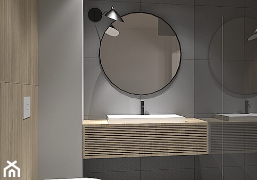 Łazienka z okrągłym lustrem - zdjęcie od Vosa Studio