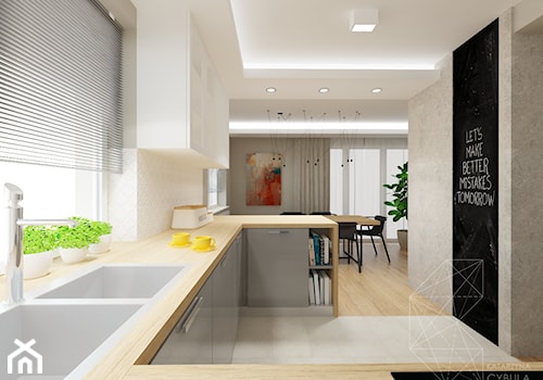 Dom 120 m2 pod Krakowem - Średnia otwarta biała czarna szara z podblatowym zlewozmywakiem kuchnia w kształcie litery l z wyspą lub półwyspem, styl nowoczesny - zdjęcie od INNers - architektura wnętrza