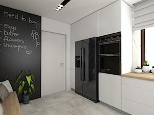Projekt kuchni w willi pod Krakowem - Średnia zamknięta czarna szara z zabudowaną lodówką kuchnia jednorzędowa z oknem - zdjęcie od STUDIO ARCHI S