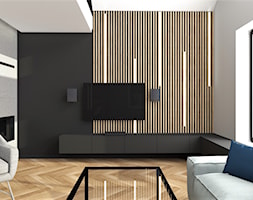 Salon z nowoczesną, podświetloną ścianą z TV i z antresolą - zdjęcie od MG Design - Homebook