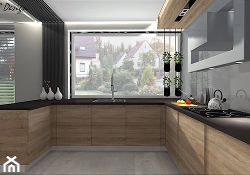 Dom w Lędzinach - Duża otwarta z salonem szara z zabudowaną lodówką z nablatowym zlewozmywakiem kuchnia w kształcie litery g z oknem, styl nowoczesny - zdjęcie od MG Design