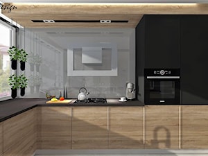 Dom w Lędzinach - Średnia zamknięta z kamiennym blatem czarna szara z zabudowaną lodówką z lodówką wolnostojącą z nablatowym zlewozmywakiem kuchnia w kształcie litery l z oknem, styl nowoczesny - zdjęcie od MG Design