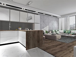 Kuchnia otwarta z białymi meblami i drewnianym blatem - zdjęcie od MG Design