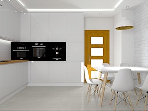 Kuchnia w bieli - Ozimek - Średnia zamknięta biała z zabudowaną lodówką kuchnia w kształcie litery l, styl nowoczesny - zdjęcie od MG Design