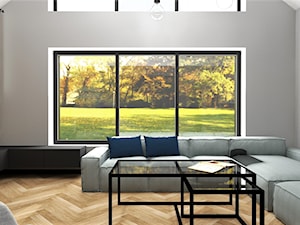 Salon z wielkim oknem i antresolą - zdjęcie od MG Design