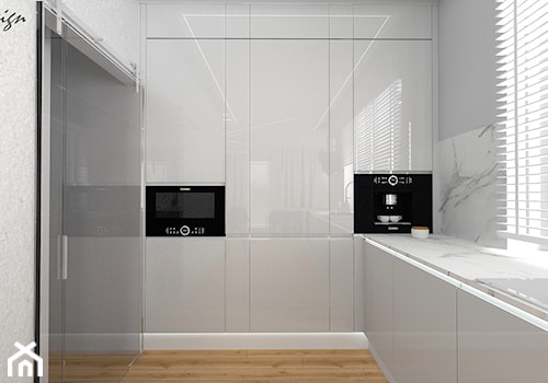 Dom w Walidrogach - Średnia szara z zabudowaną lodówką z podblatowym zlewozmywakiem kuchnia w kształcie litery l z oknem z marmurem nad blatem kuchennym, styl nowoczesny - zdjęcie od MG Design