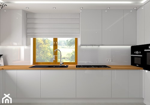 Kuchnia w bieli - Ozimek - Średnia zamknięta szara z zabudowaną lodówką z lodówką wolnostojącą z nablatowym zlewozmywakiem kuchnia w kształcie litery u z oknem, styl nowoczesny - zdjęcie od MG Design