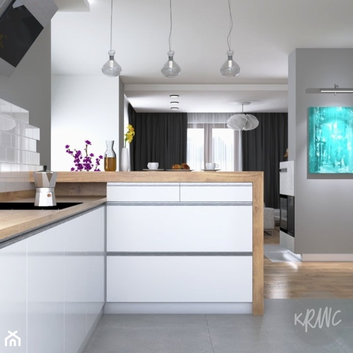 Pokój dzienny z otwartą kuchnią - Otwarta szara z zabudowaną lodówką kuchnia w kształcie litery l, styl nowoczesny - zdjęcie od KRWC Design
